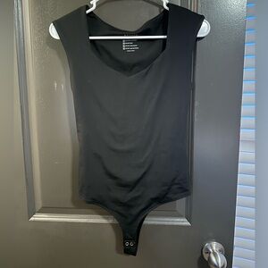 Size small black bodysuit.